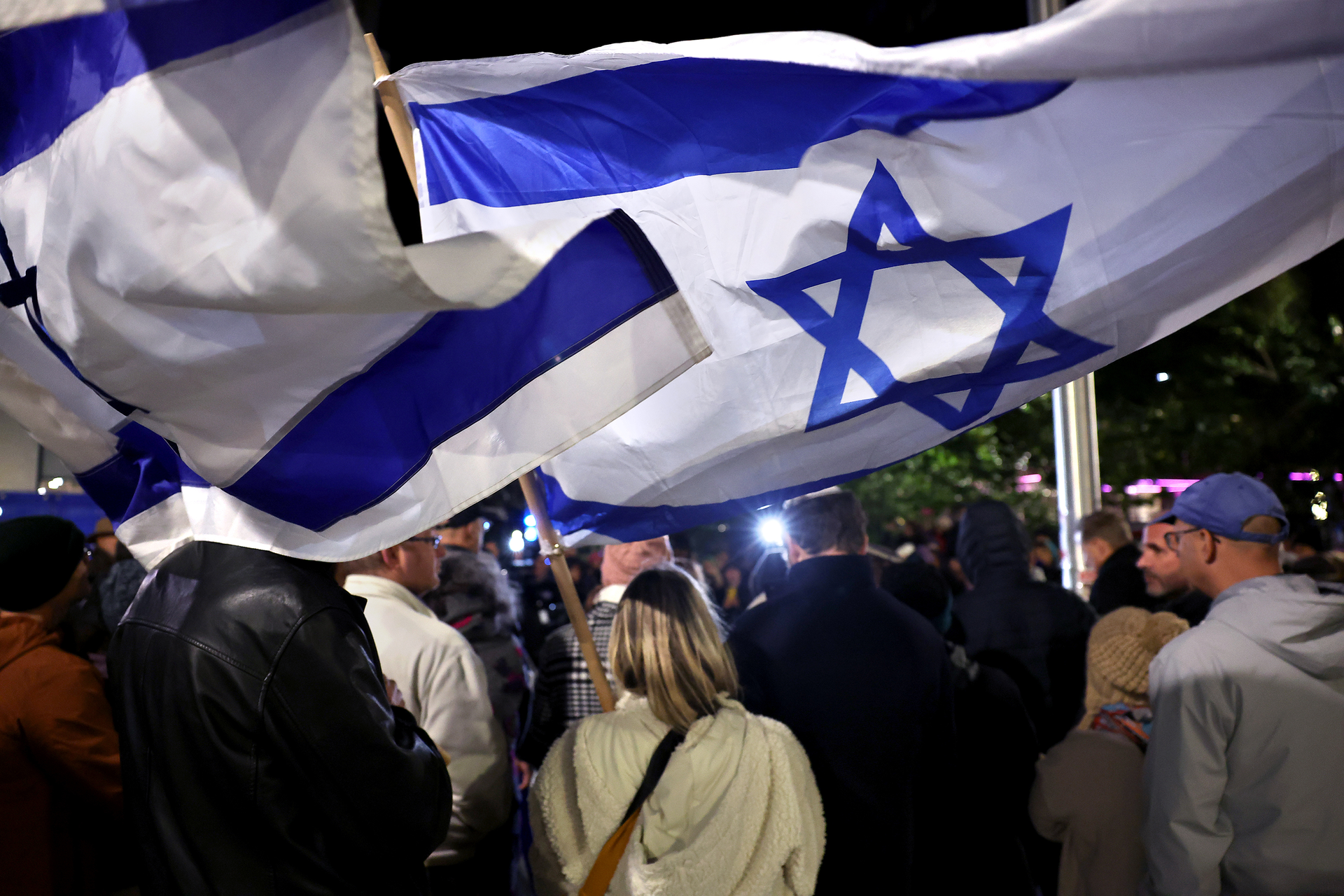 People gather in Evanston, Illinois' Fountain Square for a rally in support of the release of Israeli and international hostages currently held by Hamas in the Gaza Strip on Oct. 14, 2023.
