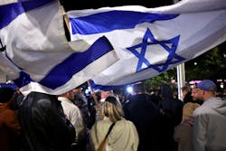 People gather in Evanston, Illinois&apos; Fountain Square for a rally in support of the release of Israeli and international hostages currently held by Hamas in the Gaza Strip on Oct. 14, 2023.