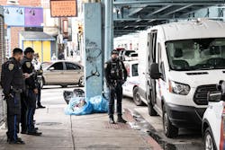 Philadelphia police officers stand near a SEPTA Somerset Station where a suspect was arrested for the stabbing at Macy’s on Monday. Philadelphia police officers stand near a SEPTA Somerset Station where a suspect was arrested for the stabbing at Macy’s on Monday.