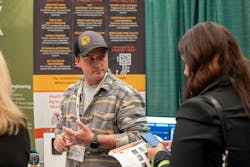 Ryan O&rsquo;Donnell, Sales Manager and Security Engineer, talks with a prospective customer during New York Cannabis Convention.
