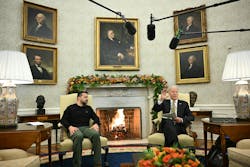 US President Joe Biden (R) speaks to the press as he meets with Ukrainian President Volodymyr Zelensky in the Oval Office of the White House in Washington, DC, on Dec. 12, 2023.