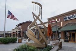 A memorial to victims of the Allen Premium Outlets mass shooting is seen, Monday, May 6, 2024, in Allen, Texas. The memorial stands 11 feet tall and has eight wind chimes, one for each of the victims of the shooting.