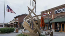 A memorial to victims of the Allen Premium Outlets mass shooting is seen, Monday, May 6, 2024, in Allen, Texas. The memorial stands 11 feet tall and has eight wind chimes, one for each of the victims of the shooting.