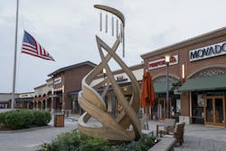 A memorial to victims of the Allen Premium Outlets mass shooting is seen, Monday, May 6, 2024, in Allen, Texas. The memorial stands 11 feet tall and has eight wind chimes, one for each of the victims of the shooting. A memorial to victims of the Allen Premium Outlets mass shooting is seen, Monday, May 6, 2024, in Allen, Texas. The memorial stands 11 feet tall and has eight wind chimes, one for each of the victims of the shooting.