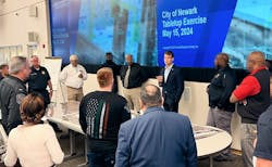 Mike Rodgers (center), CEO of Critical Response Group, participates in a recent tabletop Critical Incident Mapping exercise. Mike Rodgers (center), CEO of Critical Response Group, participates in a recent tabletop Critical Incident Mapping exercise.