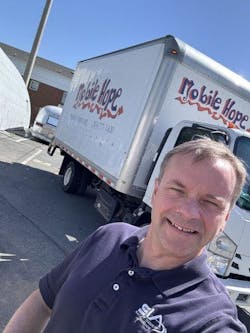SIA’s Geoff Kohl volunteered with the Mobile Hope food pantry in Leesburg, Va. SIA’s Geoff Kohl volunteered with the Mobile Hope food pantry in Leesburg, Va.