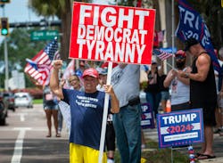 Tom Sartori, 72, of Holiday, holds a sign in support of former President Donald Trump along Court Street in downtown Clearwater on Sunday, a day after the presumptive GOP presidential nominee was injured during an assassination attempt at a rally in Pennsylvania. Tom Sartori, 72, of Holiday, holds a sign in support of former President Donald Trump along Court Street in downtown Clearwater on Sunday, a day after the presumptive GOP presidential nominee was injured during an assassination attempt at a rally in Pennsylvania.