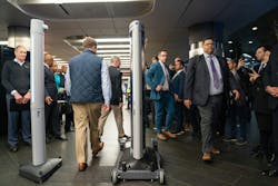 Members of law enforcement demonstrate an Evolv weapons detection during a press conference announcing weapons detectors for the New York City subway system in the Fulton Transit Center March 28, 2024, in New York City. Members of law enforcement demonstrate an Evolv weapons detection during a press conference announcing weapons detectors for the New York City subway system in the Fulton Transit Center March 28, 2024, in New York City.