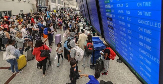 Passengers began to fill Hartsfield-Jackson International Airport early Friday morning, July 19, 2024 as a global Microsoft outage hit airlines.