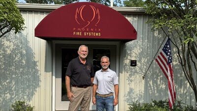 Kirk Humbrecht, Owner and President at Phoenix Fire, with Chuck Reimel, Pye-Barker's Vice President of Business Development.