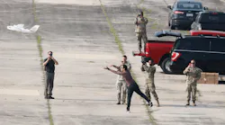 Soldiers and MITRE personnel conduct the initial testing of the CARPE Dronvm smartphone app during the launch of the testing drone. U.S. Army Central tested CARPE Dronvm at McEntire Joint National Guard Base and Poinsett Weapons Range, S.C., on July 18, 2023.
