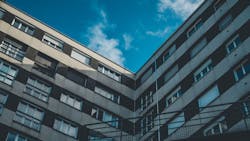 66e323a909e8ce5db4dcadfc Lowangleshotbrownwhitebuildingwithwindowsbluesky 1 66e323a909e8ce5db4dcadfc Lowangleshotbrownwhitebuildingwithwindowsbluesky 1