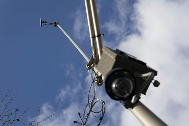 ShotSpotter gunshot detection technology is seen in use on a light pole in Chicago's Humboldt Park neighborhood in February.