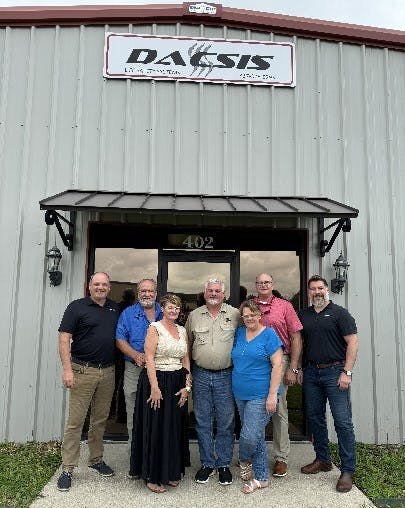 The teams meet in Louisiana. From left to right: Justin Merrick, Pye-Barker's VP of Business Development; DACSIS Owners Silas Pellegrin, Pam Pellegrin, Barry Hohensee and Laurie Hohensee; and Pye-Barker's Mike Pepper and Ben Brooks.