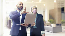 thumbnail_iamsofficebuildingpeoplediscussing1