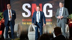 SIA's Geoff Kohl moderated a lively panel discussion between rival video surveillance VPs, Tom Cook of Hanwha Vision (left) and Fredrik Nilsson of Axis Communications (right). SIA's Geoff Kohl moderated a lively panel discussion between rival video surveillance VPs, Tom Cook of Hanwha Vision (left) and Fredrik Nilsson of Axis Communications (right).