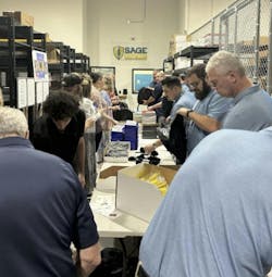 SAGE Integration's Atlanta branch loaded backpacks for Mission 500. SAGE Integration's Atlanta branch loaded backpacks for Mission 500.