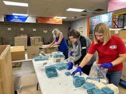American Digital Security team members packed essential hygiene products for Giving the Basics. American Digital Security team members packed essential hygiene products for Giving the Basics.