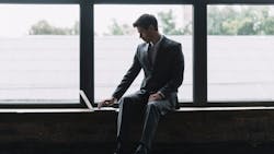 674f44082a90fe110864318e Youngbusinessmansittingfrontwindowtypinglaptop 232 674f44082a90fe110864318e Youngbusinessmansittingfrontwindowtypinglaptop 232