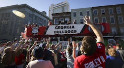 Georgia cheerleaders throw beads to fans as the Georgia float travels down Decatur Street during the Allstate Sugar Bowl New Year’s Eve Parade, Tuesday, Dec. 31, 2024, in New Orleans. Georgia cheerleaders throw beads to fans as the Georgia float travels down Decatur Street during the Allstate Sugar Bowl New Year’s Eve Parade, Tuesday, Dec. 31, 2024, in New Orleans.
