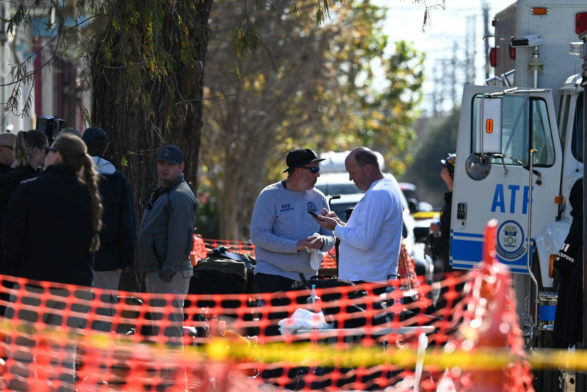 Agents of the US Bureau of Alcohol, Tobacco, Firearms and Explosives (ATF) are seen outside a house on Mandeville Street, where bomb-making materials were found in connection with the New Orleans terror ramming attack. A fire broke out, and bomb-making materials were found in a short-term rental property, where the man who killed at least 10 people in New Orleans early on New Year's Day may have stayed before plowing his pickup truck into a crowd.