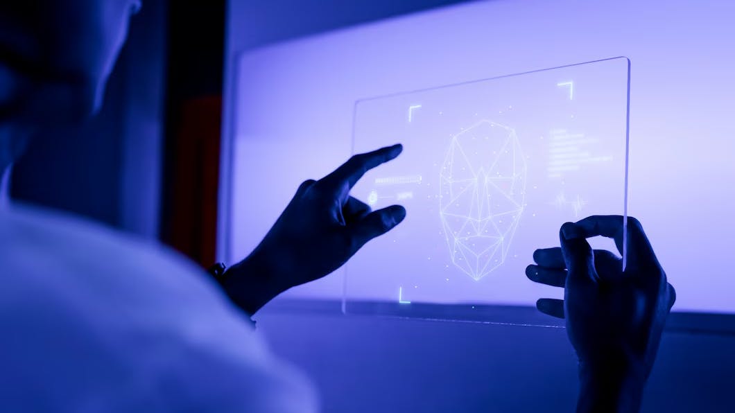 67a277ac0b487444c20426b5 Designerusingtransparentdigitaltabletscreenfuturis