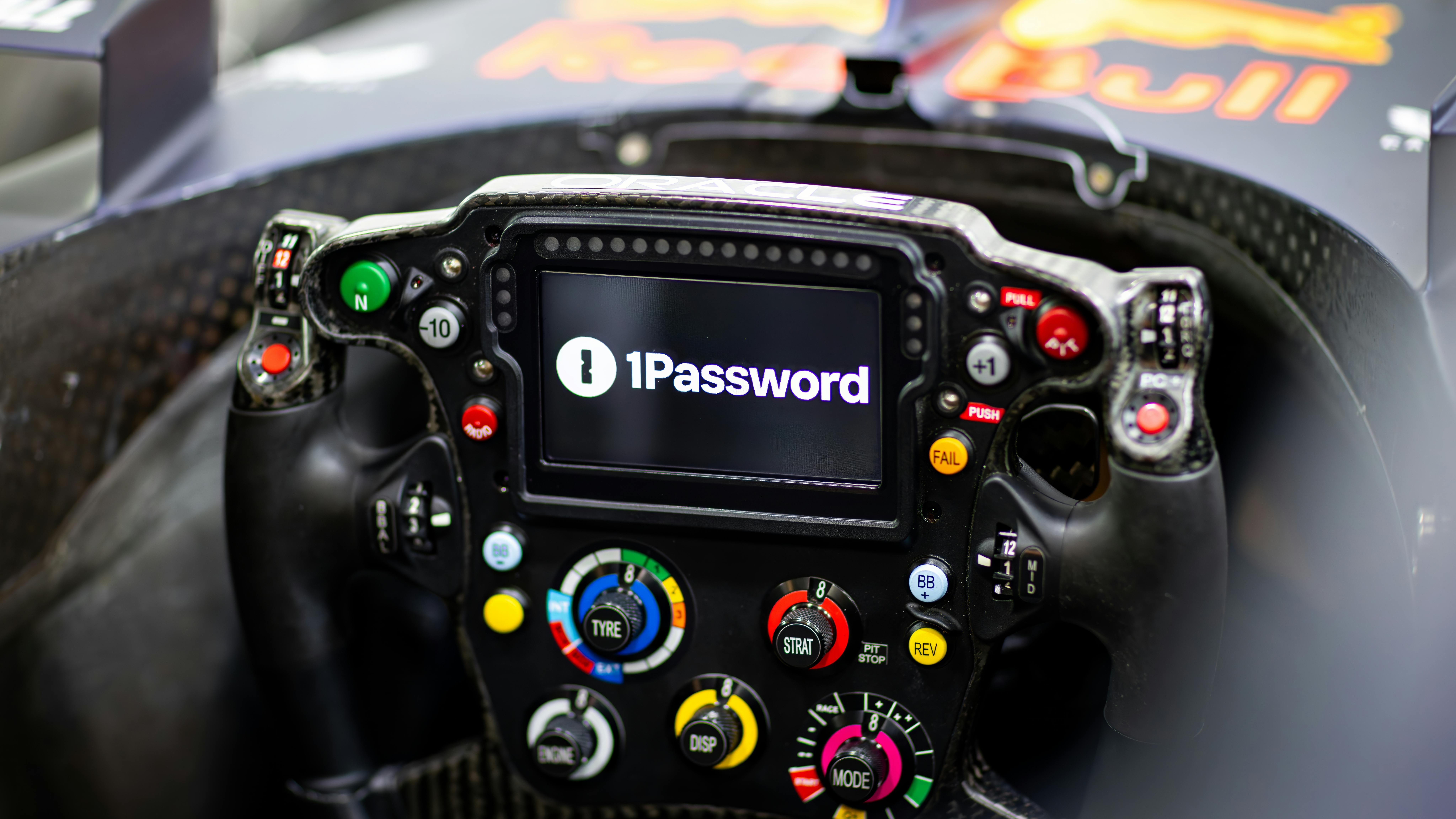 In a Team first, 1Password branding will be shown on the steering wheel screen of both Max and Liam&rsquo;s RB21 challengers.