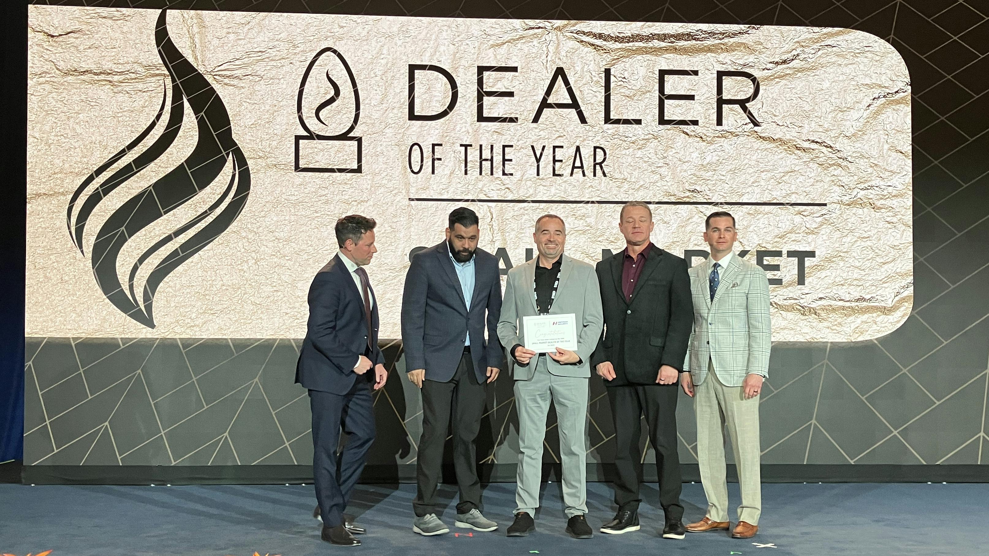Hoffman Security of California accepts DMP's Small Market Dealer of the Year honor.