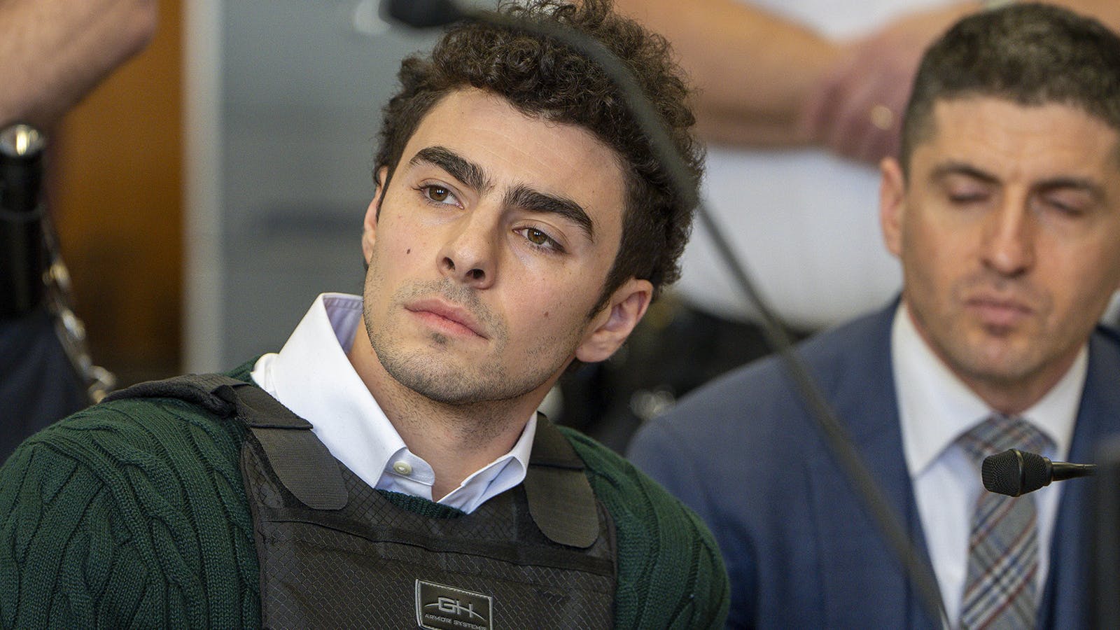 Luigi Mangione attends a hearing at Manhattan Criminal Court on Feb. 21, 2025, in New York City. Mangione is accused of slaying UnitedHealthcare CEO Brian Thompson late last year and is making his first appearance on state charges of murder as an act of terrorism. He is facing 11 counts for the Dec. 4 shooting of Thompson outside a midtown Manhattan hotel, which set off a massive manhunt. He is also facing federal charges of murder and other charges in Pennsylvania, where he was arrested. (Steven Hirsch/Pool/Getty Images/TNS)