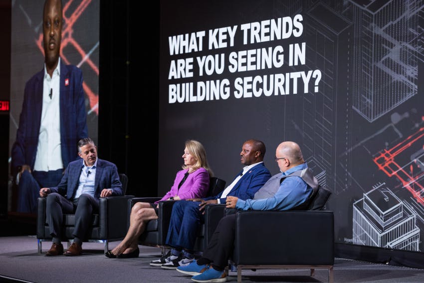 Honeywell's Jeff Stanek, left, moderated the panel as speakers discussed emerging trends in building security, automation and integrated technologies during the 2025 Honeywell Users Group conference in Phoenix.