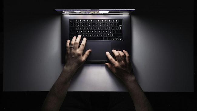 685da8554093ffe5e223696f Manusinglaptopnightworkplacetopview