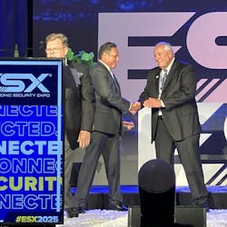 Alarm industry icon Stan Martin (right) was double honored at ESX, receiving special recognition for lifetime achievement by both the Security Industry Alarm Coalition and the Electronic Security Association. Alarm industry icon Stan Martin (right) was double honored at ESX, receiving special recognition for lifetime achievement by both the Security Industry Alarm Coalition and the Electronic Security Association.