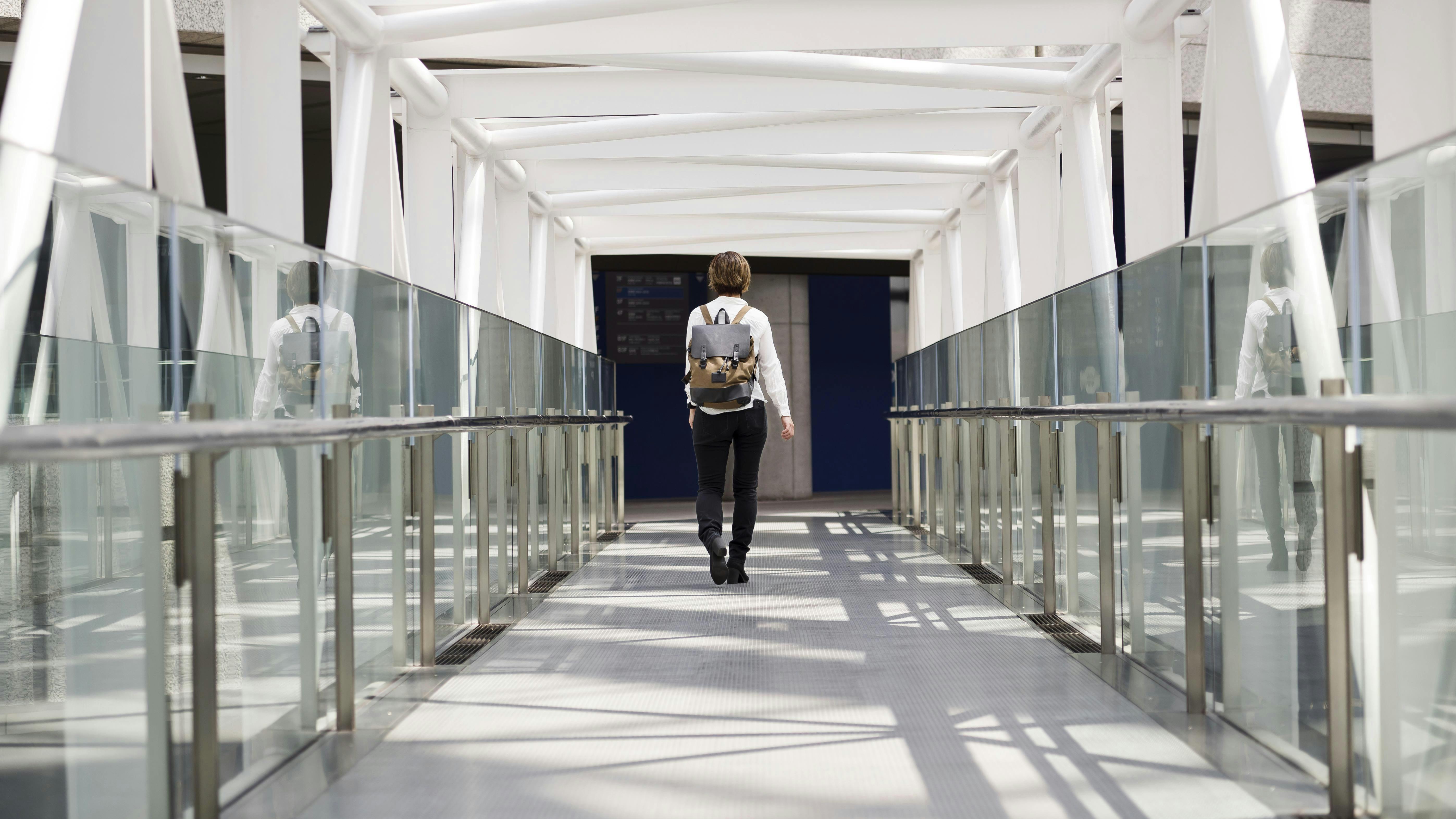 6889126980dd378529be3484 Longshotwomanwithbackpack