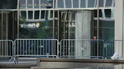 Aland Etienne, the security guard murdered in a mass shooting in the lobby of a Park Ave. skyscraper, spent the final moments of his life trying to save others, NYPD officials revealed Wednesday.