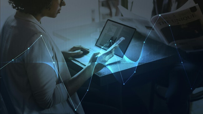 68911160671f834112574a50 Businesswomannetworkingusingdigitaldevices