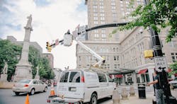 Technicians work on Lancaster’s downtown traffic camera system from a App-Techs Corp. bucket truck, part of the city’s expanded camera network that is helping police enhance public safety and investigations. Technicians work on Lancaster’s downtown traffic camera system from a App-Techs Corp. bucket truck, part of the city’s expanded camera network that is helping police enhance public safety and investigations.