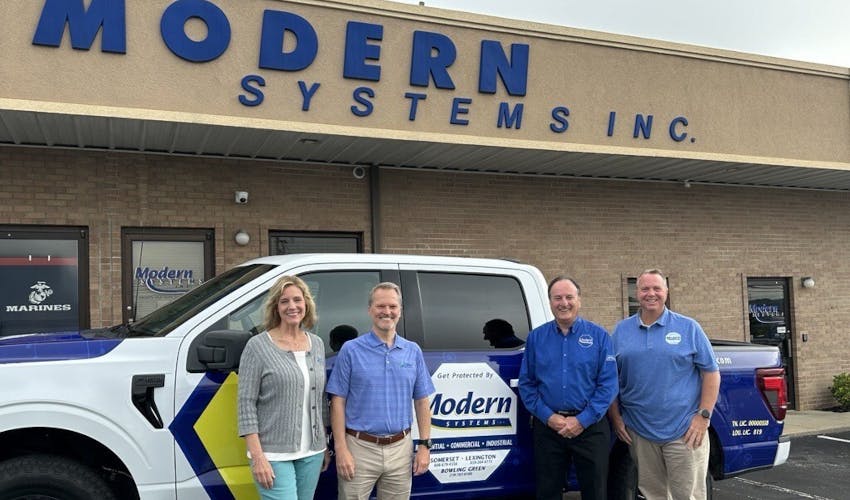 L-R: Cindy Ponder, Pye-Barker Regional Manager; Jeremy Bates, Pye-Barker VP of Business Development; David Morris, Modern Systems Founder and President; Kevin Lloyd, VP at Modern Systems.