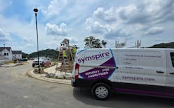 A Symspire technician team installs equipment at a new residential development site as the company’s service vehicle stands nearby. Symspire provides integrated security, fire, and audio/video systems for residential and commercial customers across Tennessee. A Symspire technician team installs equipment at a new residential development site as the company’s service vehicle stands nearby. Symspire provides integrated security, fire, and audio/video systems for residential and commercial customers across Tennessee.