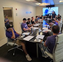 Symspire technicians gather for a team meeting at company headquarters, reflecting President James Ward’s belief that a strong, people-first culture is key to delivering quality service and long-term success. Symspire technicians gather for a team meeting at company headquarters, reflecting President James Ward’s belief that a strong, people-first culture is key to delivering quality service and long-term success.