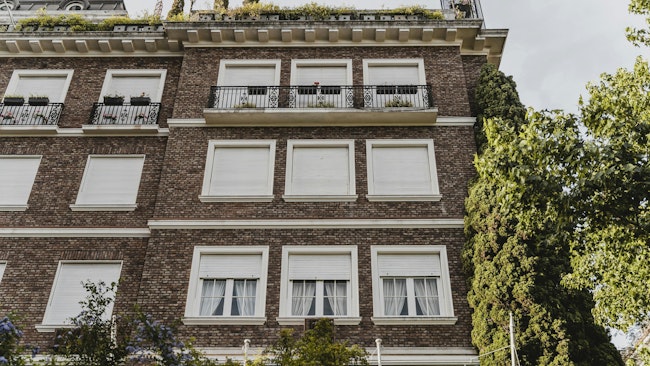 68b8a6577106039cd3e0f41f Lowangleapartmentbuildingwithwindowscity