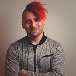 Mike Burnside, performance marketing manager at Keyfactor, led the creation of a cybersecurity-themed music album using AI tools and a lot of lyrical coaching. “The AI does all the real work,” he says, “but it needs a huge amount of coaching.” Mike Burnside, performance marketing manager at Keyfactor, led the creation of a cybersecurity-themed music album using AI tools and a lot of lyrical coaching. “The AI does all the real work,” he says, “but it needs a huge amount of coaching.”