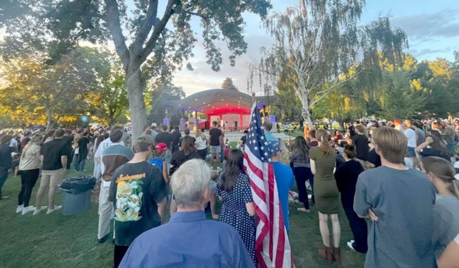 Hundreds fill a city park Thursday evening in Orem, Utah, in a tribute to Charlie Kirk. (Grace Toohey/The Los Angeles Times/TNS)
