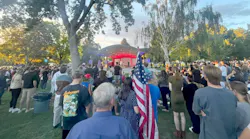 Hundreds fill a city park Thursday evening in Orem, Utah, in a tribute to Charlie Kirk. (Grace Toohey/The Los Angeles Times/TNS)