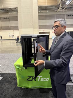 ZKTeco President Manish Dalal demonstrates the use of the palm to open the smart key cabients, in addition to giving demos of the company's access control, visitor management, intercom, and other products. ZKTeco President Manish Dalal demonstrates the use of the palm to open the smart key cabients, in addition to giving demos of the company's access control, visitor management, intercom, and other products.