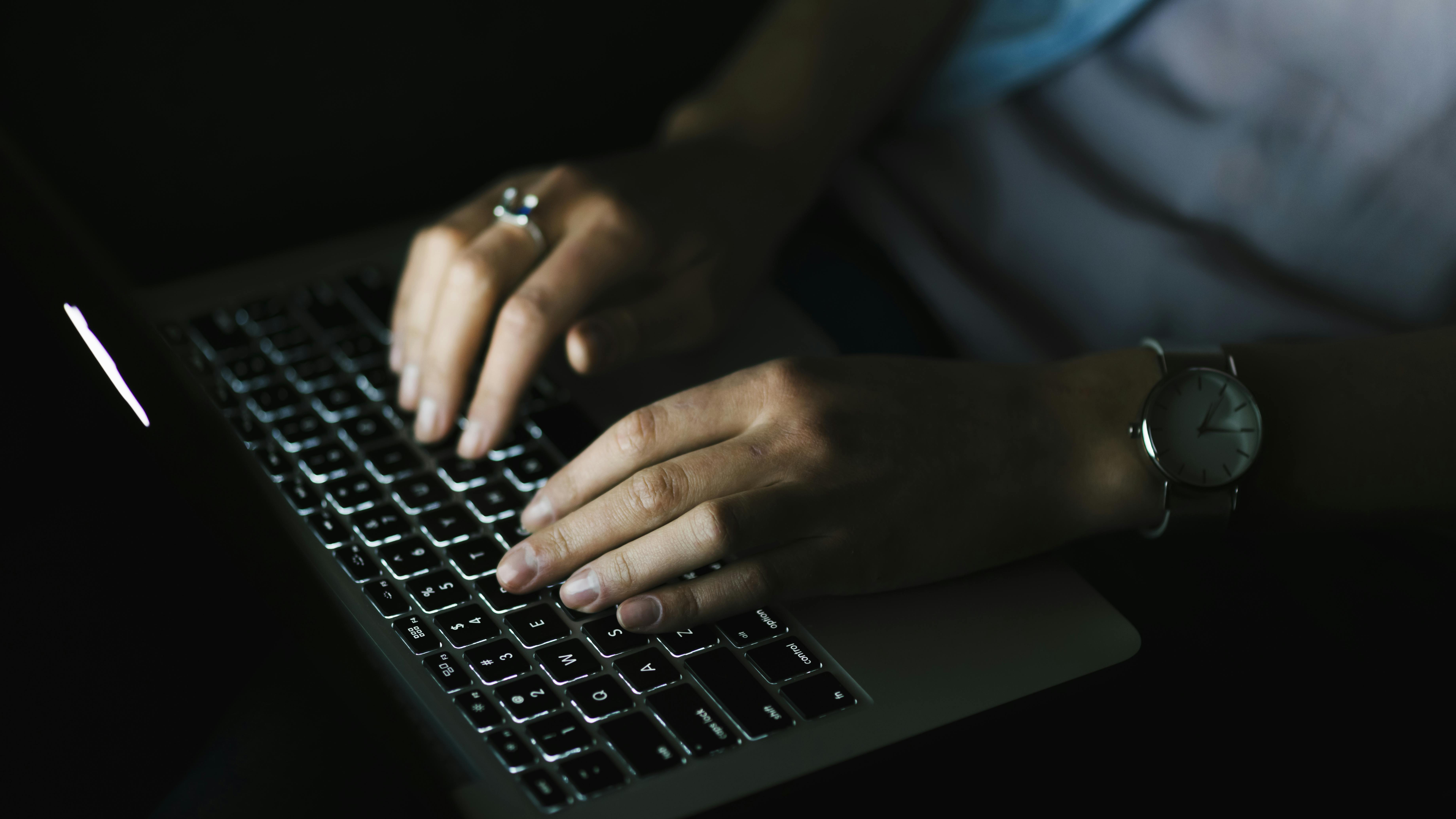 690e58ad250f0a2e9e860ba9 Cropwomanusinglaptopdarkroom