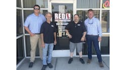 Pye-Barker and Red E Fire team members at the newly acquired company's headquarters in Las Vegas. Pye-Barker and Red E Fire team members at the newly acquired company's headquarters in Las Vegas.