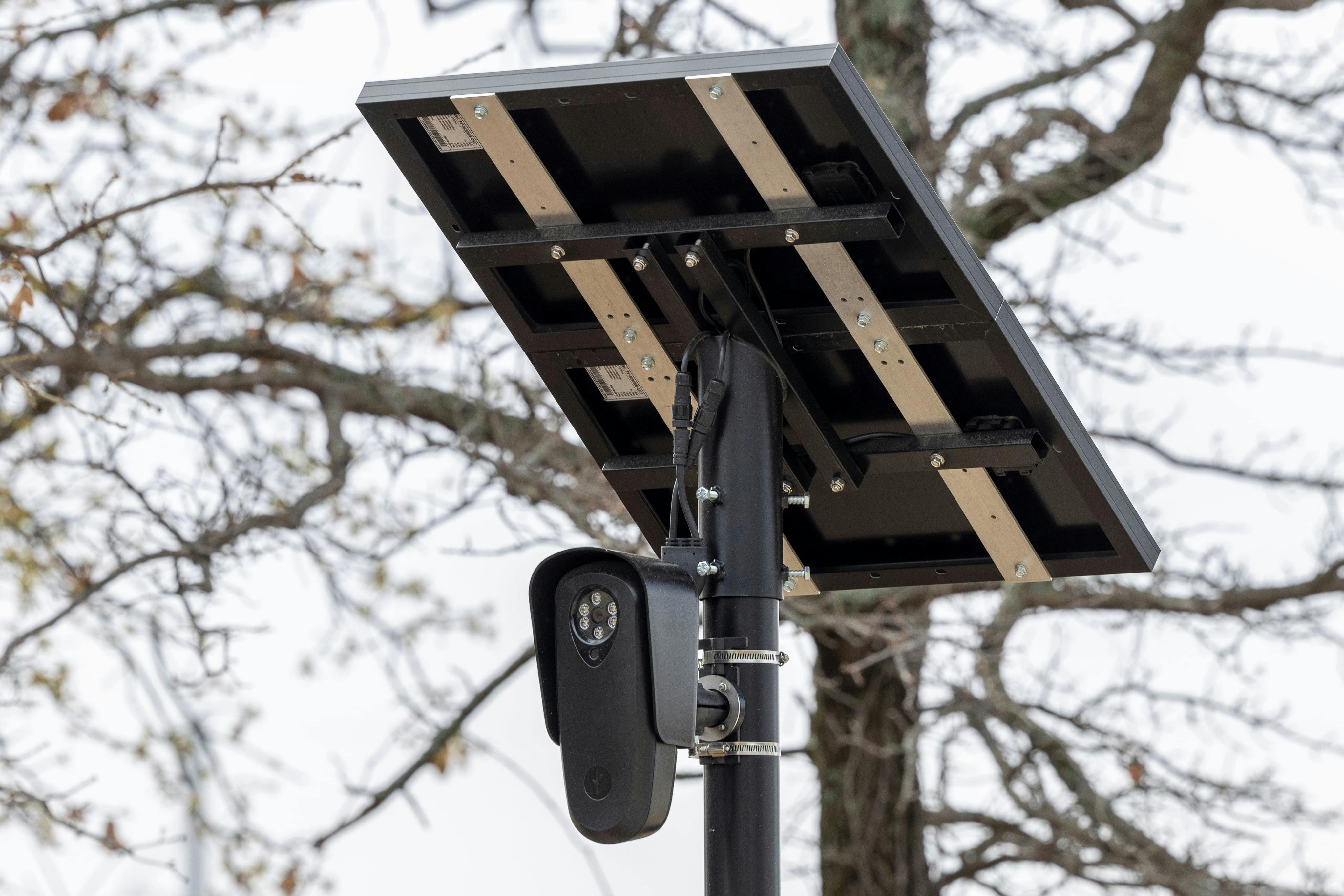 A license plate camera pictured along Trophy Wood Drive near Trophy Club Town Hall in Trophy Club, Texas, Wednesday, March 30, 2022. The license plate-reading cameras, usually mounted on 12-foot poles, have quickly become standard in police departments across the country, including the Dallas Police Department.