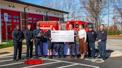 Members of the Steele Creek Fire Department and CPI Security gather outside the station as the company presents a check funding the department’s first drone, supporting enhanced search and rescue capabilities. Members of the Steele Creek Fire Department and CPI Security gather outside the station as the company presents a check funding the department’s first drone, supporting enhanced search and rescue capabilities.