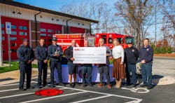 Members of the Steele Creek Fire Department and CPI Security gather outside the station as the company presents a check funding the department’s first drone, supporting enhanced search and rescue capabilities. Members of the Steele Creek Fire Department and CPI Security gather outside the station as the company presents a check funding the department’s first drone, supporting enhanced search and rescue capabilities.