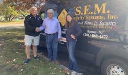 S.E.M. Security Systems and Pye-Barker team members. S.E.M. Security Systems and Pye-Barker team members.